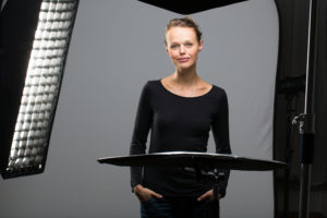 Image of a professional woman posing for website photos